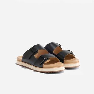 Nisolo Black and Tan Sandals with Elegant Design